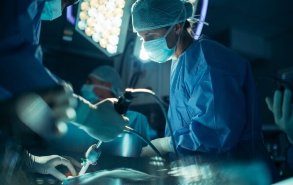 Portrait,Of,A,Female,Surgeon,Using,Laparoscopy,Instrument,,Working,On